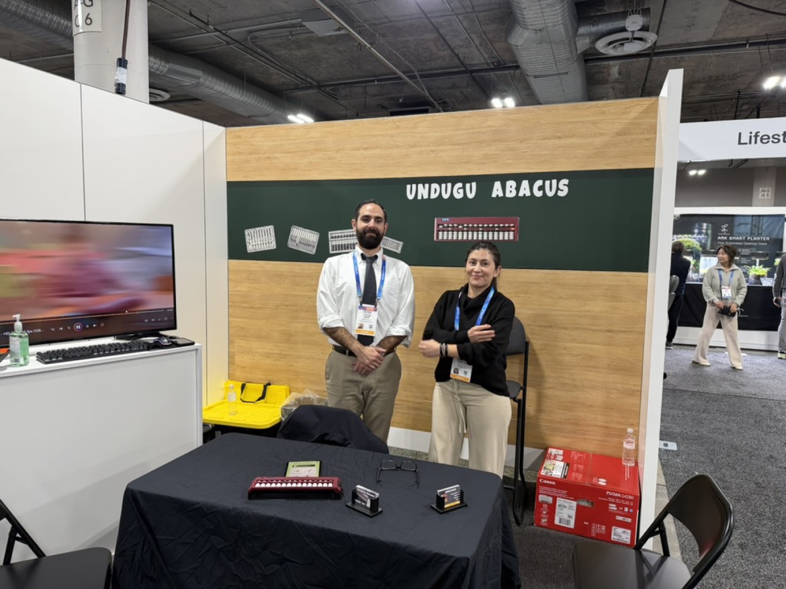 The Undugu team at the CES booth